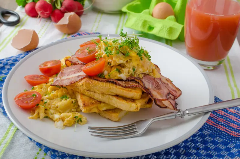 scrambled-eggs-bacon-french-toast-tomato