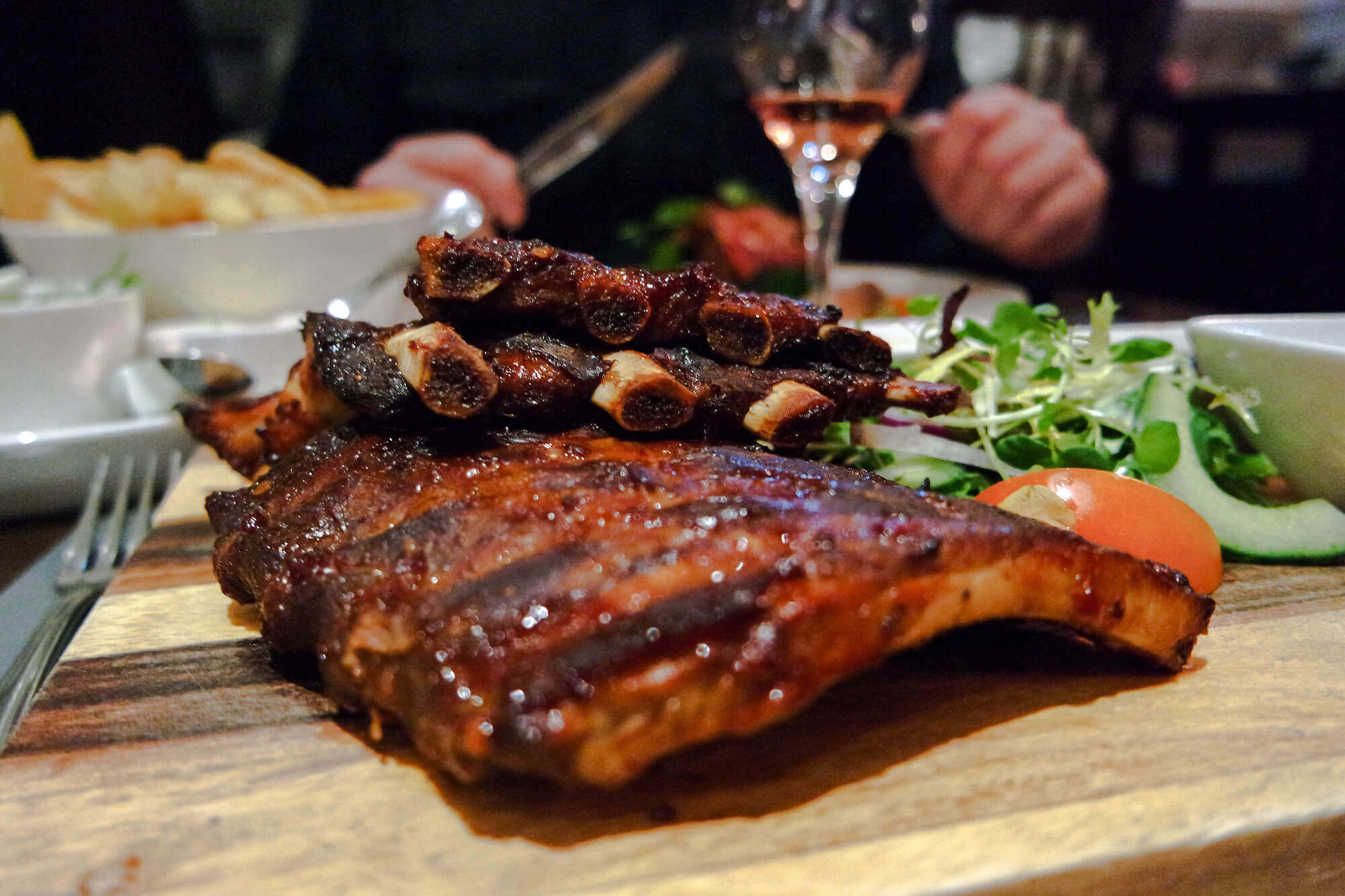 tasty-pork-ribs-laying-on-the-cutting-board-2023-11-27-05-07-43-utc-1.jpg